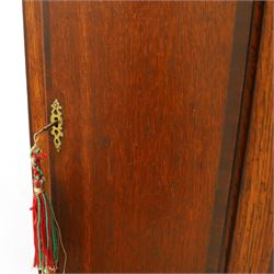 Thomas Hawkswell of Brompton (Nr Pickering-Yorks), 8-day oak cased longcase clock with a swan necked pediment and central brass finial, break arch hood door flanked by reeded pilasters with brass capitals, trunk with canted corners and a spire topped door, square plinth raised on a shaped skirting, painted dial with floral spandrels and makers name to the arch, with Roman numerals, calendar and seconds dial and pierced steel hands, dial pinned to a twin train rack striking movement, striking the hours on a bell. With weights and pendulum.