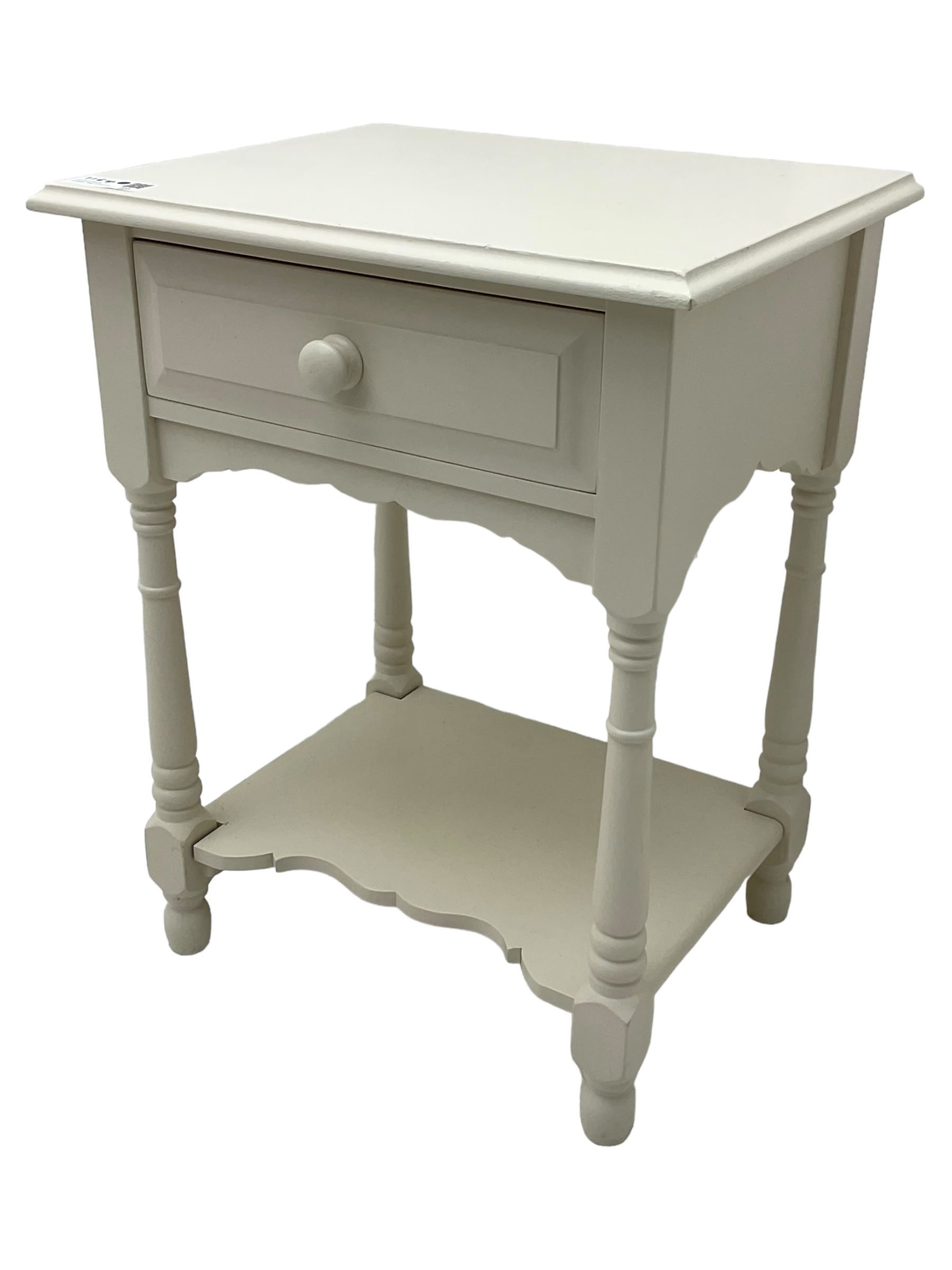 Cream-painted 5' King-size bedstead, shaped headboard carved with foliage cartouche; together with cream-painted bedside table, fitted with single drawer over undertier (W50cm, D40cm, H65cm) 