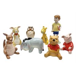 Set of eight Winnie the Pooh Beswick figures, comprising Christopher Robin, Winnie the Pooh, Tigger, Piglet, Rabbit, Eeyore, Owl and Kanger, six with original boxes, tallest H12cm  