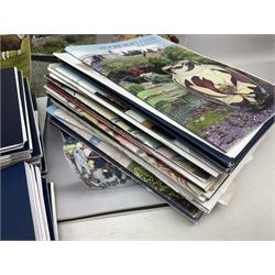 Moorcroft, 1897-1993 revised edition; an illustrated guide to Moorcroft Pottery, a hard back book by Paul Atterbury, together with a quantity of Moorcroft Collector's Club magazines