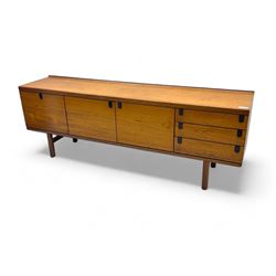 White & Newton - mid-20th century teak sideboard, rectangular top with raised back over fall-front storage compartment, double cupboard and three drawers, raised on cylindrical supports