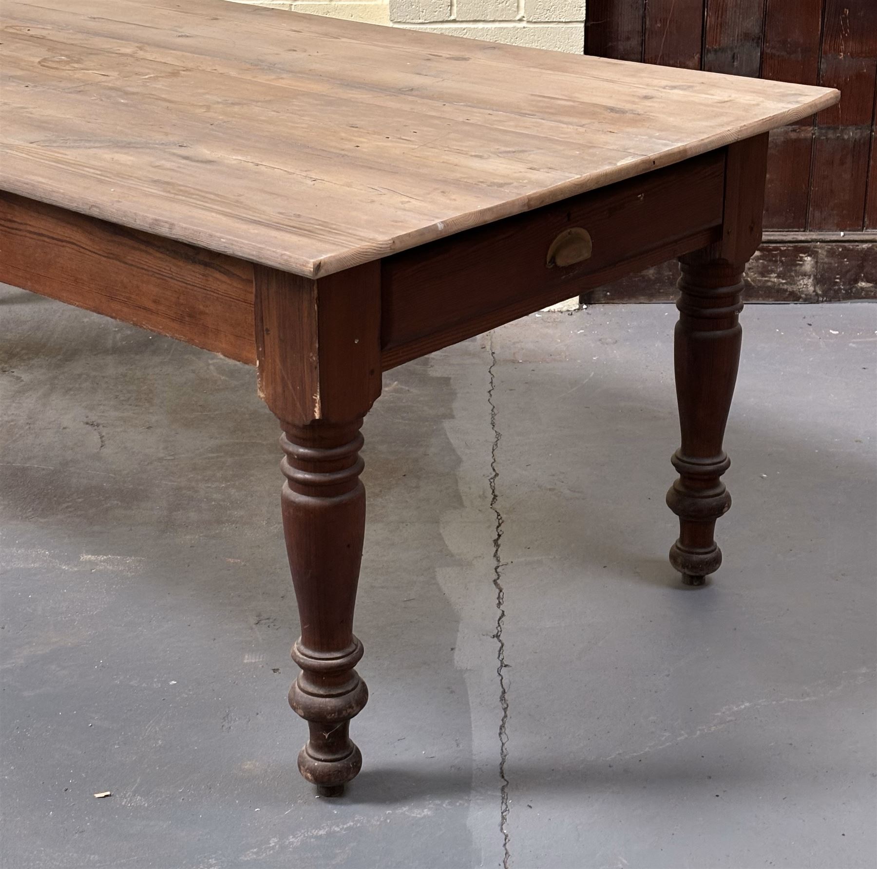 Stained pine dining table, late 19th century and later, the rectangular top above a drawer to each end, raised on ring turned and tapered supports. H80cm, 244cm x 110cm.  - COLLECTION BY APPOINTMENT FROM: The White House, Thirsk Road, Easingwold, York, YO61 3NF - CALL 01723 507111 TO ARRANGE
