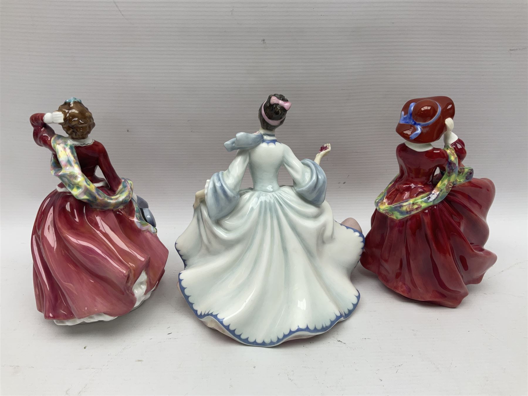 Eight Royal Doulton figures, including Ascot HN2356, Rebecca HN2805, Top o the Hill HN1833 etc