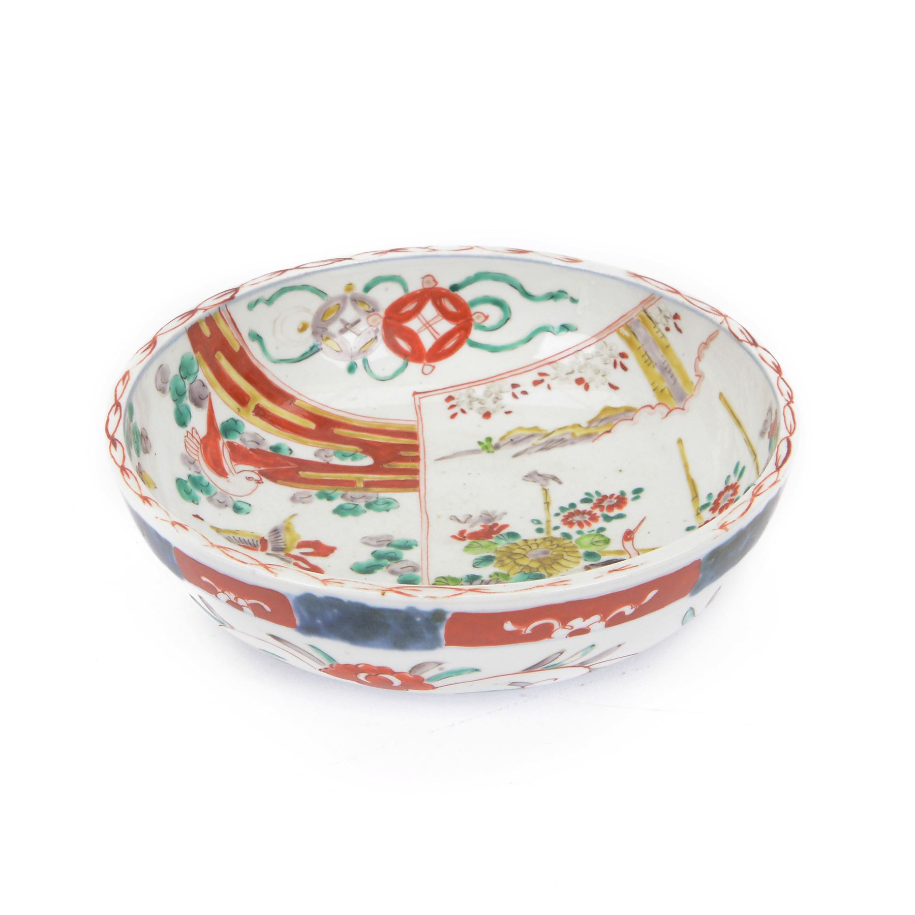 Japaneses imari bowl, decorated to the interior with a crane within a landscape, birds and insects, the external decoration of foliate scrolls, D25cm 