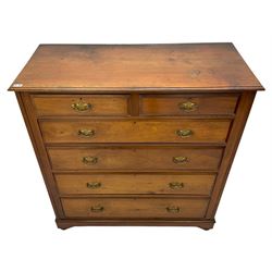 Pair Edwardian walnut chests, rectangular moulded top over two short and four long drawers, bracket plinth with compressed bun feet