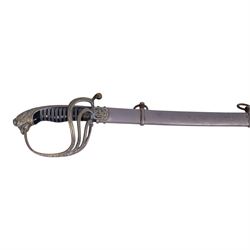 Spanish Dress Sword, 80cm single edge steel blade, etched Fabrica de Toledo, the nickel hilt with pierced guar, wire bound grip and eagle head pommel, with steel scabbard, overall L100cm