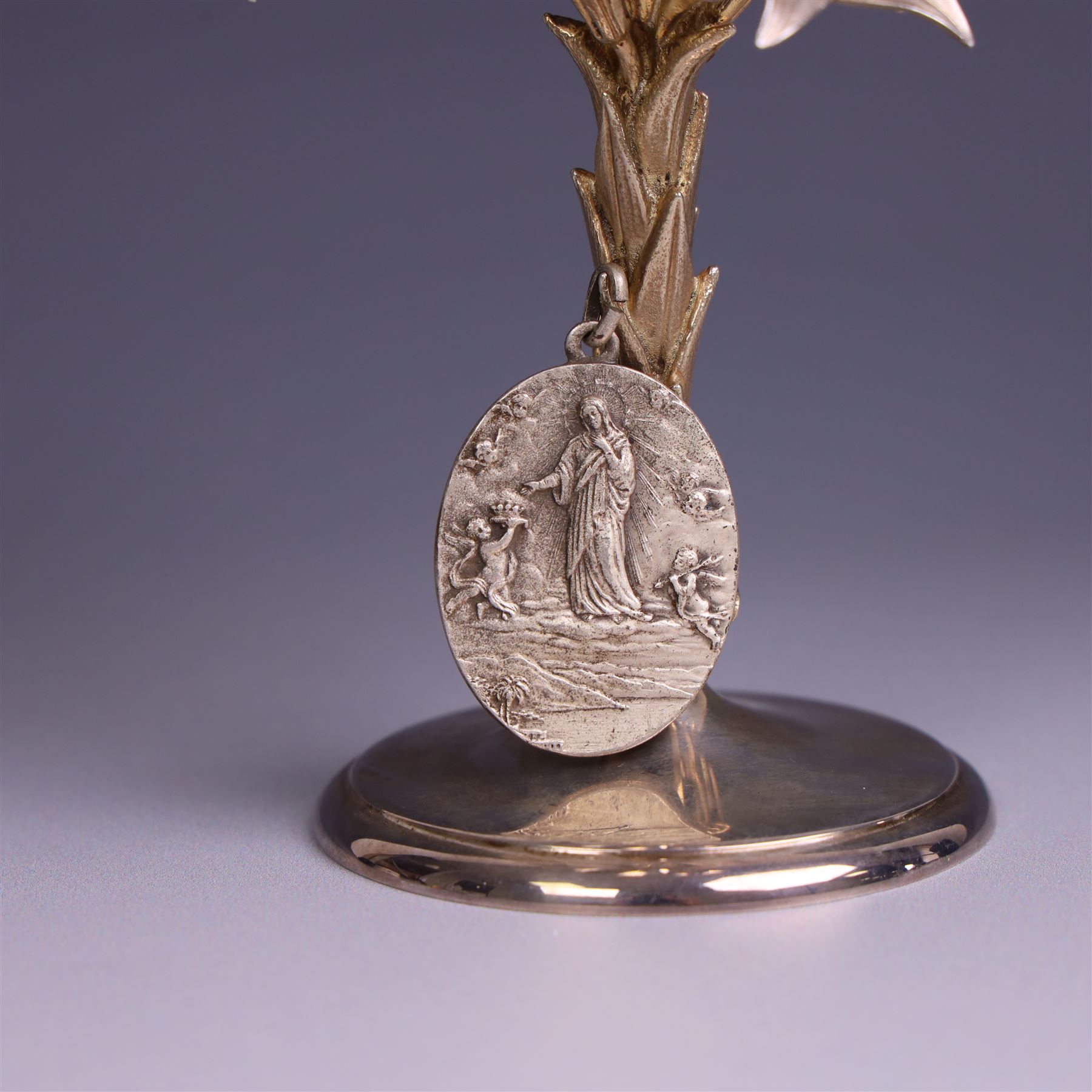 Modern limited edition silver goblet, 'made by order the provost and charter of Blackburn to commemorate the fiftieth anniversary of the cathedral in 1976 and its consecration in 1977' designed by Hector Miller for Aurum, the plain fluted cup, upon a stem of three lillies with parcel gilt highlihts and upon a circular foot, no. 2/750, hallmarked Hector Miller, London 1977, H17cm, boxed with certificate of authenticity
