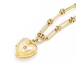 Victorian 18ct gold trombone link necklace, suspending a 15ct rose gold heart locket, set with a single old cut diamond