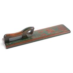 Mid 19th century Norwegian carved mangle board, dated 1836, of rectangular form with carved dala horse handle, with geometic red floral carvings upon a green ground, L63cm