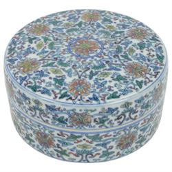 20th century Chinese Doucai box, of circular form, decorated in polychrome enamels with flowers and foliage, with character marks beneath, D18cm, H9cm