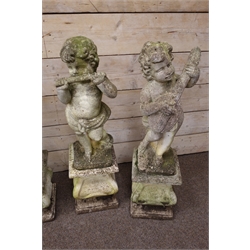  Set of five composite stone cherub musician figures, each playing a different instrument, with four shaped square pedestals, H110cm, (9)   