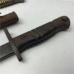 WWI Remington Pattern 1913 bayonet, the 43cm fullered blade with various marks to the ricasso including date code 11 16; in leather covered scabbard with various stamps including JWB 17 L58cm overall; and a French Model 1866 sabre bayonet (no scabbard)