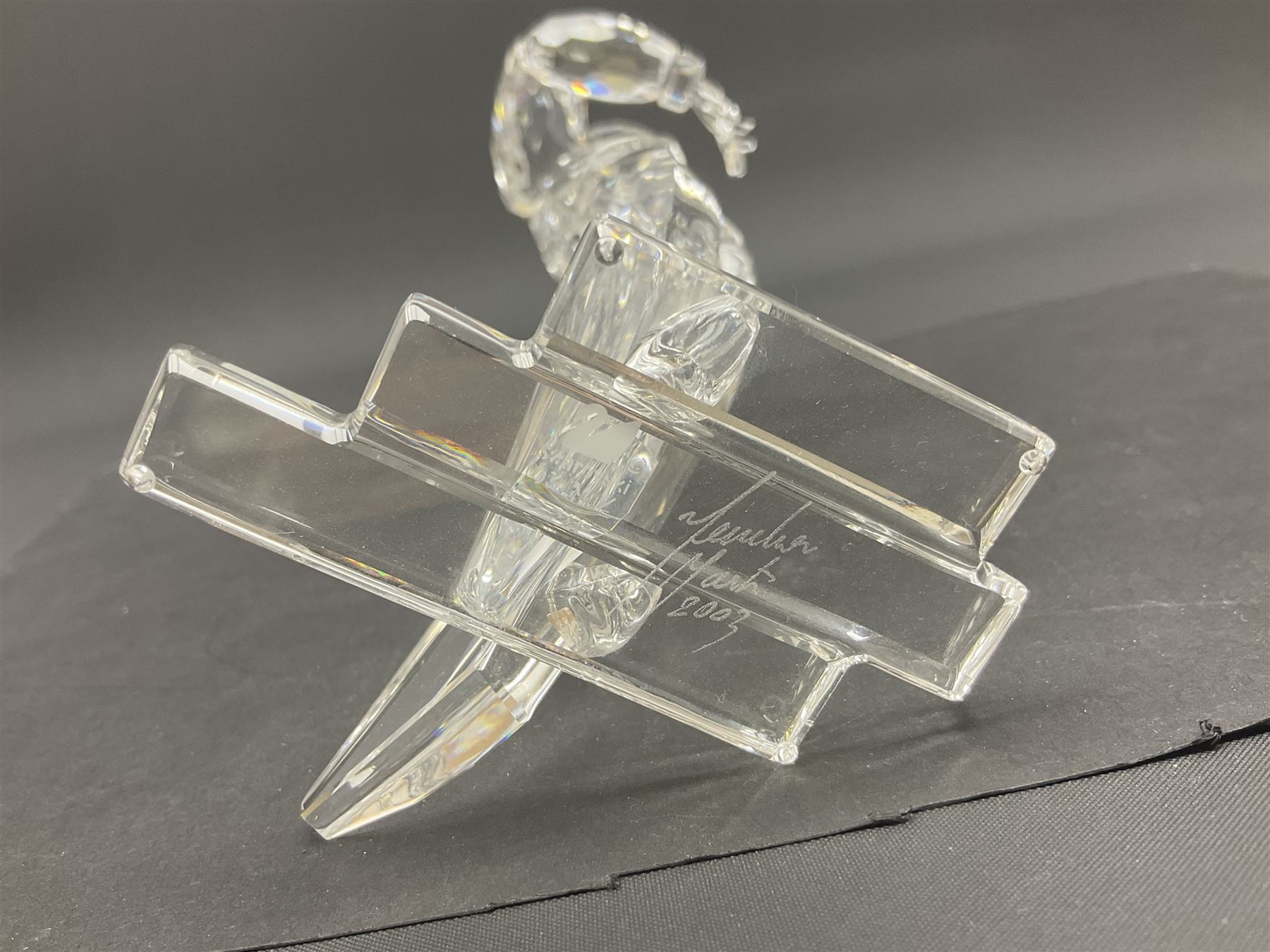 Three Swarovski figures, comprising flamenco dancer, female dancer with certificate and ballerina, tallest H21cm  