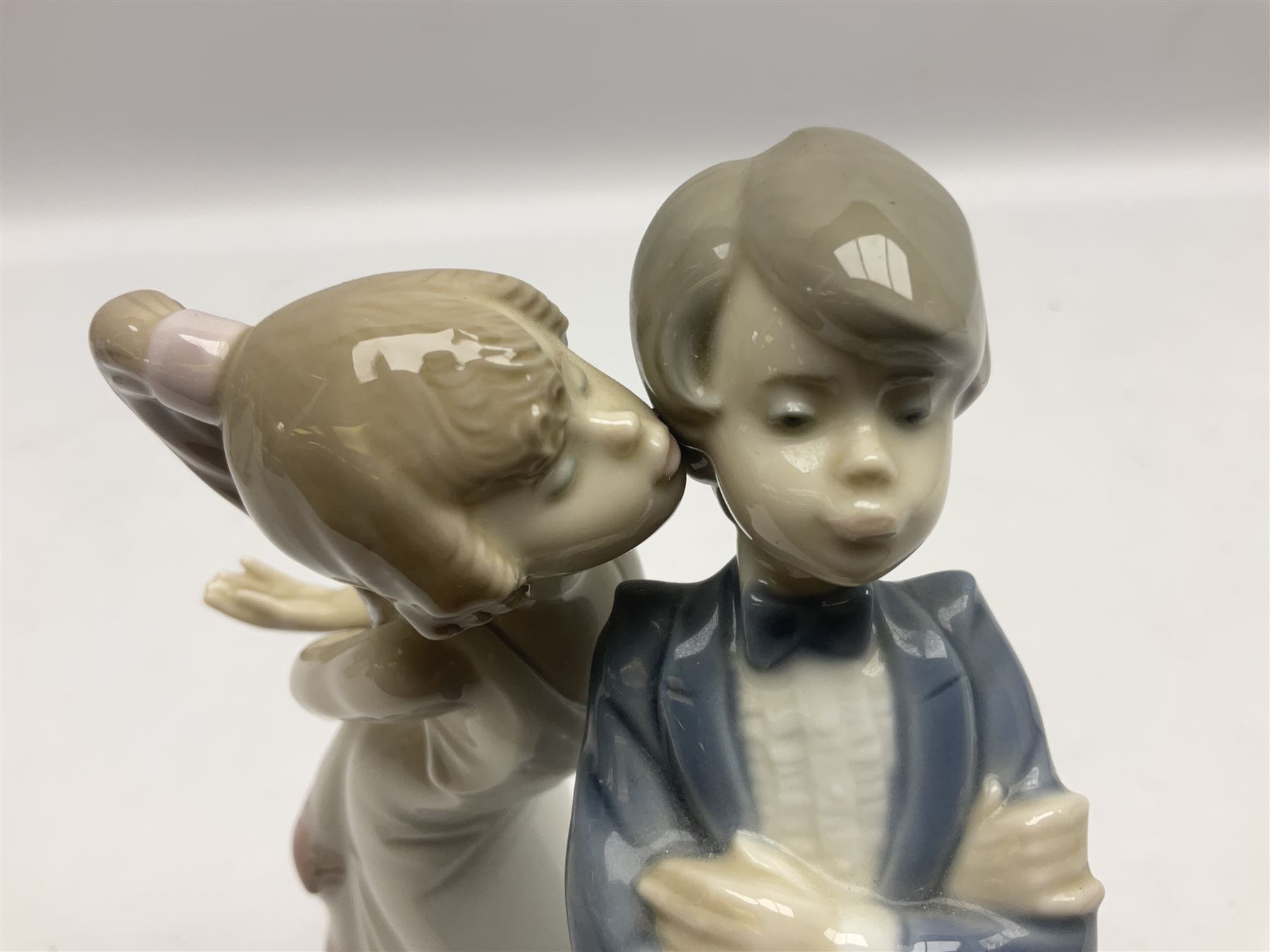 Two Lladro figures, comprising Now & Forever no 7642 and Kiss & Make Up no 5555, largest example H28cm