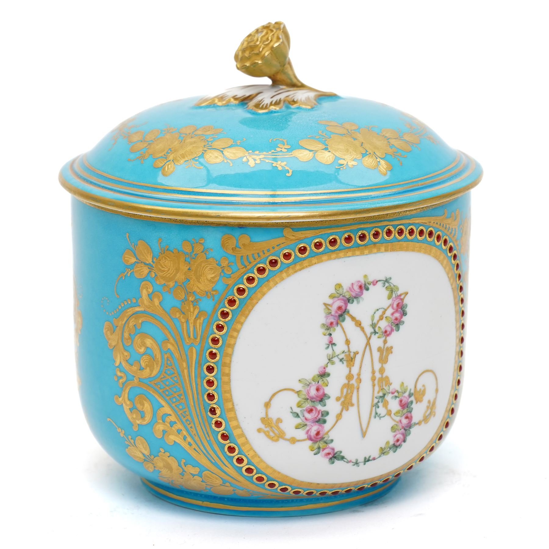 Sevres dejeuner 'Bleu turquoise' tea service for six covers, decorated by Charles-Eloi Asselin, comprising six teacups and saucers, teapot, milk jug and covered sucrier, the bleu de ciel ground painted with portraits of the French courtiers, each piece with name to base (some rubbed) of those depicted, to include Marie Antoinette (teapot), Madame de Montesson, Madame du Barry, Madam de Genlis, Madame Elizabeth (sucrier), Madame de Lamballe (milk jug) Madame Victoire, and two others unidentified, within finely painted gilt surround, each portrait encircled by red jewelled borders, the saucers with corresponding monograms within similar floral gilt and jewelled borders, Sevres mark to base with painted 'ee', dating these 1782, teapot H14cm 