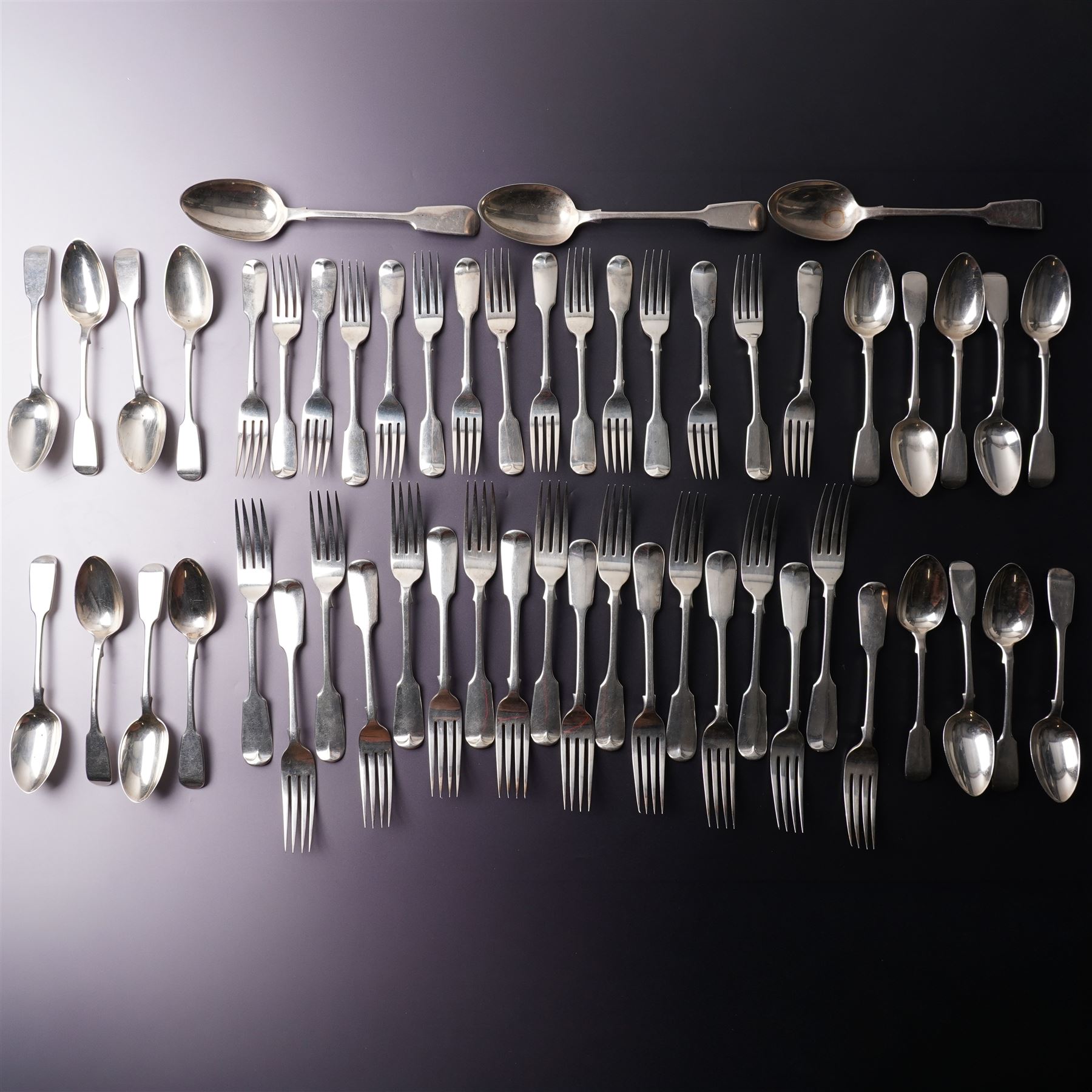 Suite of Victorian silver fiddle pattern cutlery comprising eighteen table forks, seventeen dessert spoons, fifteen dessert forks and three table spoons London 1856 Maker A B Savory & Sons
