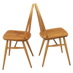 Ercol - set of four 'Windsor' waxed elm chairs, with hoop back design, on tapering supports