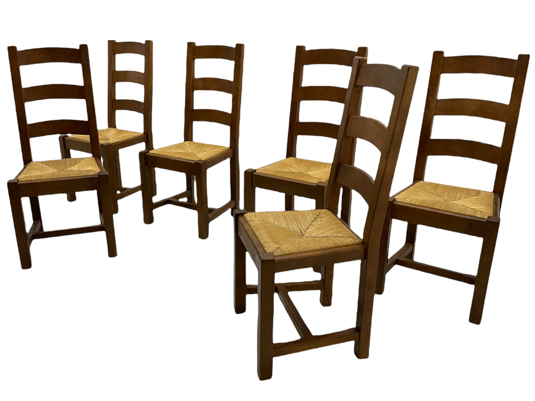 Antix French oak dining table with two leaves, two frieze drawers;, and six ladder back chairs with rush seats