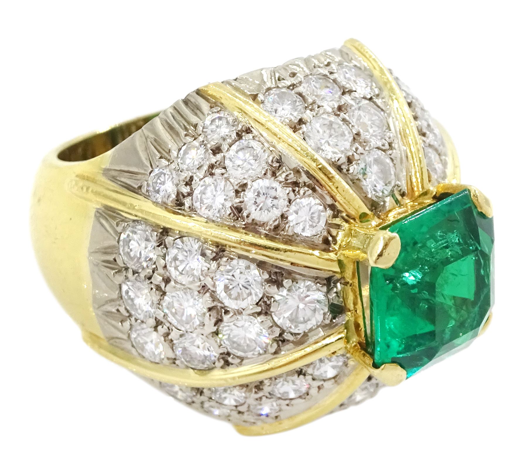 18ct white and yellow gold emerald and diamond dome ring, octagonal cut emerald, surrounded by eight sections of pave set round brilliant cut diamonds, emerald approx 3.65 carat, total diamond weight approx 4.00 carat