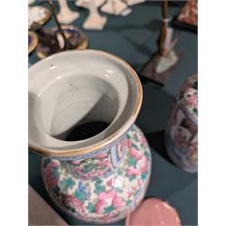 Pair of Chinese Canton famille rose vases, with panels of court terrace scenes surrounded by foliate borders, H35cm 