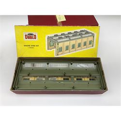 Hornby Dublo - 5005 Engine Shed Kit (2-Road), in pictorial box; 5006 Engine Shed Extension Kit with 1575 Lighting Kit, both boxed; and 5020 Goods Depot Moulded Kit, boxed (3)