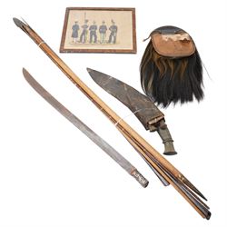Nepalese kukri with skinning knives in leather scabbard, horse hair and leather sporran by...