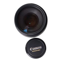 Eight camera lenses, comprising Canon Ultrasonic Zoom EF 75-300mm 1:4-5.6 lens, AF Nikkor 35-70mm 1:3.3-4.5 lens, Nikkor 60-180mm 1:4.5-5.6 lens, Canon Zoom EF 28-80mm 1:3.5-5.6 lens, Canon Zoom EF 80-200mm 1:4.5-5.6 lens, Sigma 70-300mm 1:4.6-5.6 DL Macro, Sigma Zoom 70-210mm 1:4-5.6 UCII lens and a Sigma AF 70-300mm 1:4-5.6 APO Macro lens, all with lens caps