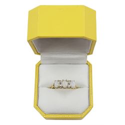 Gold three stone opal ring, with four diamond accents set between, stamped 18ct