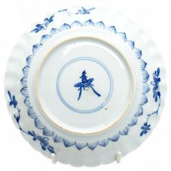 Set of six Chinese blue and white saucers, mostly Kangxi period, comprising matching pair decorated with insects and birds, example with painted lions and tigers, four bearing blue painted 'lingzhi' fungus mark to base, the others unmarked (6)