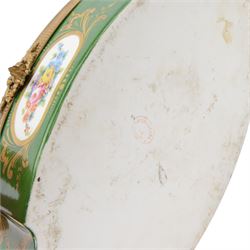 French bombee casket, Sevres style, painted with floral sprays inside gilt frames on a a green ground the cover decorated with a courting couple, signed Poirson, H18cm