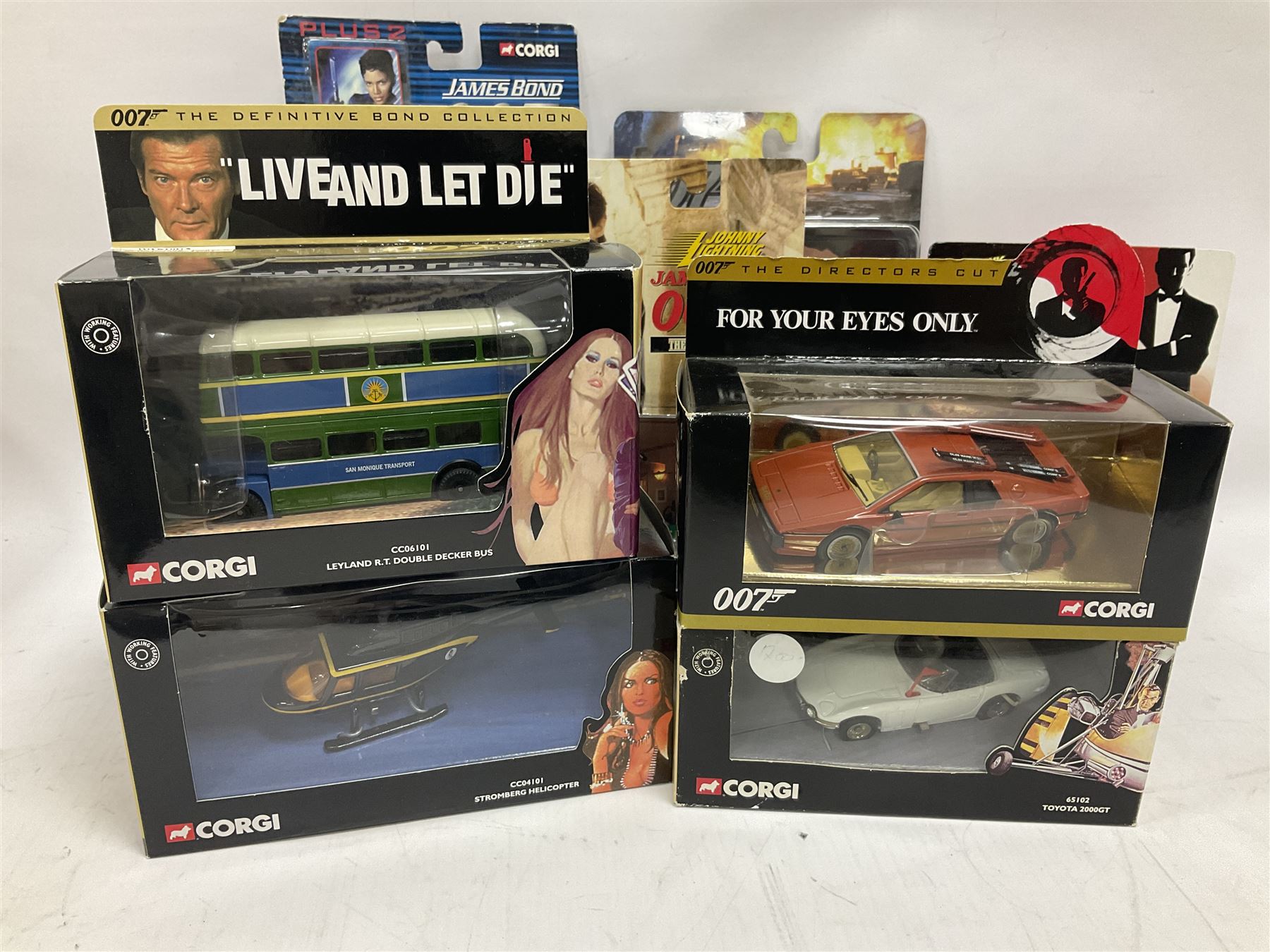 Corgi - The Definitive Bond Collection and The Director's Cut - nine die-cast vehicles from You Only Live Twice, Goldfinger, For Your Eyes Only, Diamonds Are Forever etc; Corgi Classics Moonraker Shuttle and Lotus Esprit; two other Corgi James Bond packs; Carrera Die Another Day Aston Martin V12 Vanquish; nine Johnny Lightning carded James Bond vehicles; Dragon carded Wai Lin figure; and three Fabbri tanks; all boxed/packaged (27)