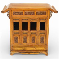 Late 20th century Chinese elm altar cabinet, rectangular overhanging top with scroll ends ...