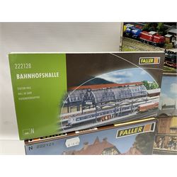 'N' gauge trackside accessories - seven Faller buildings and bridges etc Nos.N212113, N222121, N222583, N222174, N222128, Z282730 & Z282707; two others by Vollmer Nos.N7657 & N7724; four boxes of Gaugemaster Ballasted Underlay; grit and Foliage Clusters