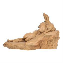 Thomas Cartier (1879-1943); terracotta sculpture of a boy sleep watched over by two dogs, signed to base, H40cm