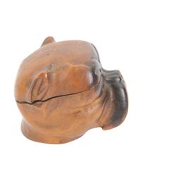 Novelty desk inkwell formed as a boat, with central chimney opening to reveal a metal inkwell with two pens formed as oars, together with another inkwell in the from of a bull dog 