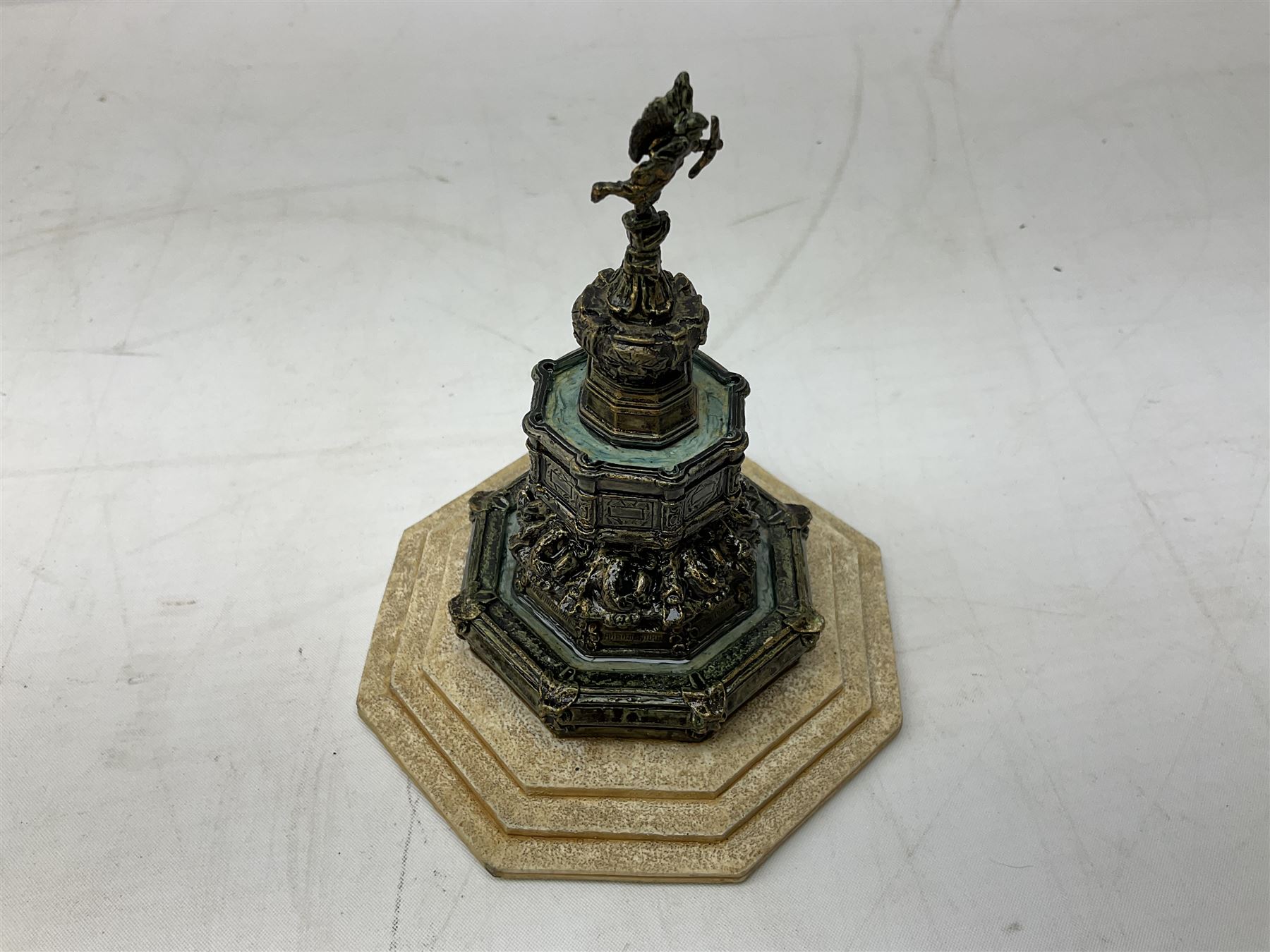 Five Lilliput Lane models from the 'Britain's Heritage' collection, comprising The Royal Albert Hall, Windsor Castle Round Tower, Eros and Nelson's Column and another snowed, all boxed