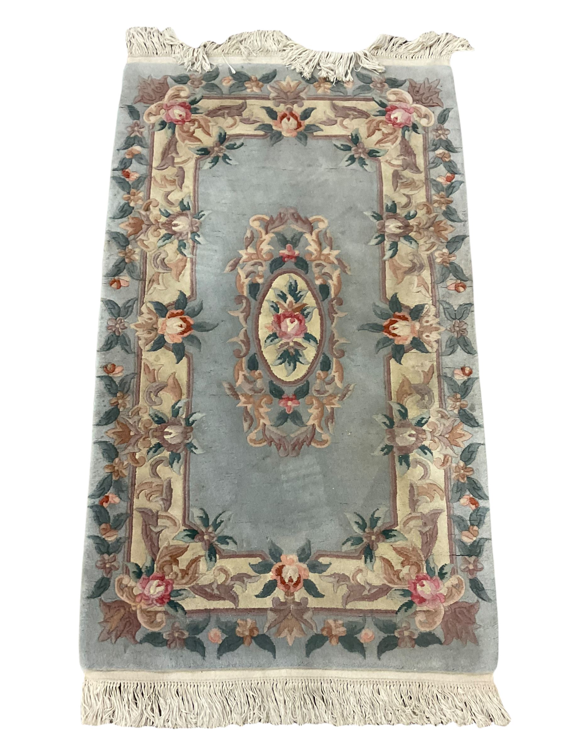 Small Bokhara green rug, Chinese hearth rug and two modern Persian design rugs