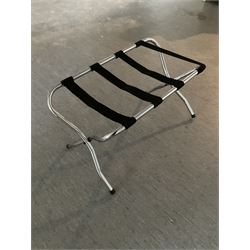 Sixteen folding luggage stands (16)- LOT SUBJECT TO VAT ON THE HAMMER PRICE - To be collected by appointment from The Ambassador Hotel, 36-38 Esplanade, Scarborough YO11 2AY. ALL GOODS MUST BE REMOVED BY WEDNESDAY 15TH JUNE.