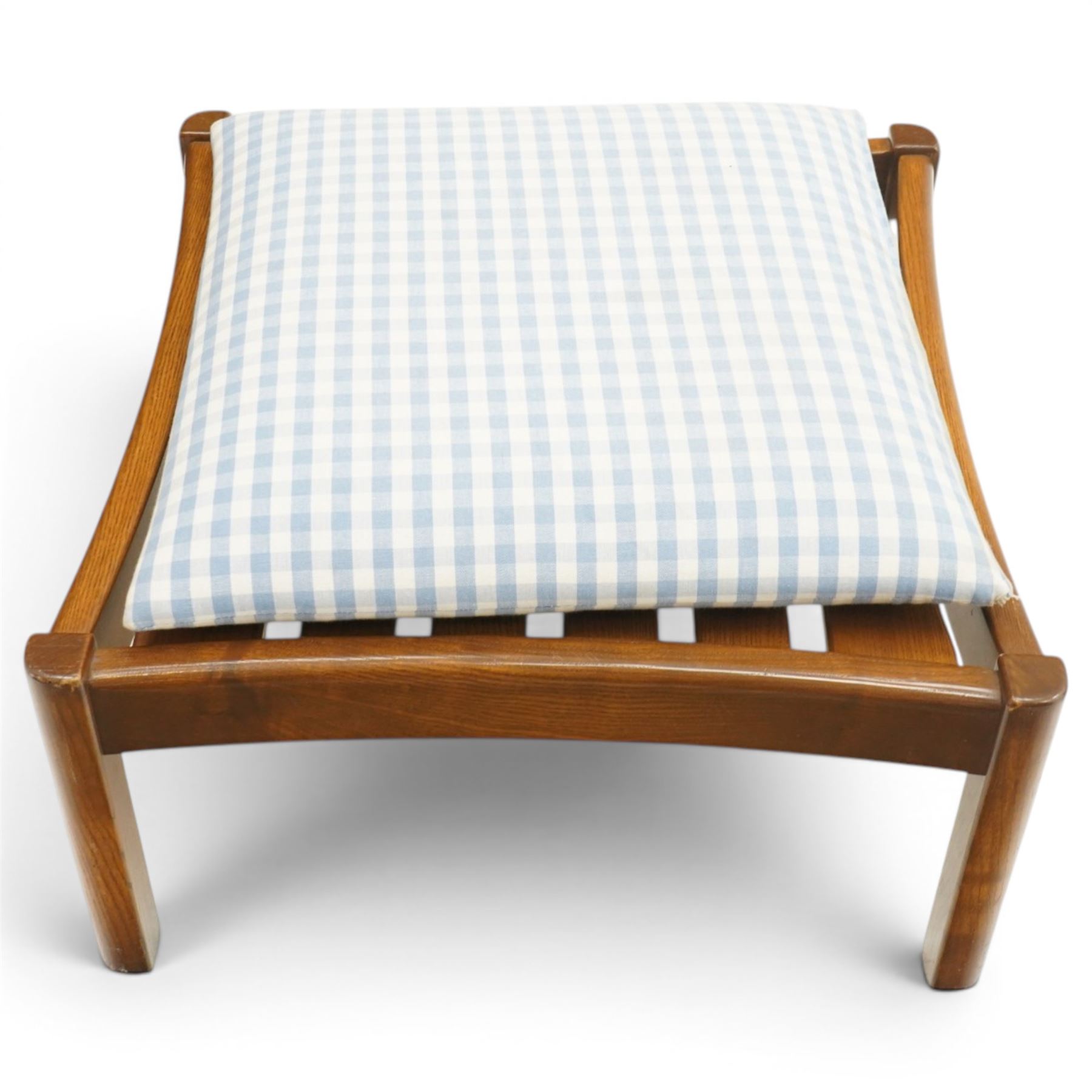 Ercol - 'Fleur de Lis' Windsor elm armchair and footstool, with blue gingham checked seat cushions