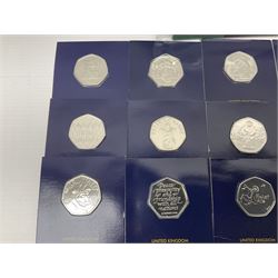 Mostly United Kingdom Queen Elizabeth II commemorative fifty pence coins, including 2019 'Gruffalo', 2020 'Iguanodon', 2022 'The Queen's Jubilee' etc, housed on cards, face value of UK coins approximately 20 GBP