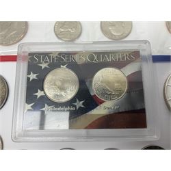 United States of America coinage, including 1876S half dollar (holed), various quarter dollars, 1986 one ounce fine silver dollar, 1988 uncirculated coin set etc