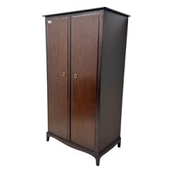Stag Minstrel - pair of mahogany double wardrobes, comprising a larger wardrobe with a shelf and hanging rail behind two panelled doors (W127cm, D59cm, H177cm); and a smaller wardrobe enclosing a single hanging rail (W96cm, D59cm, H177cm), both finished with projecting cornices and raised on bracket feet



