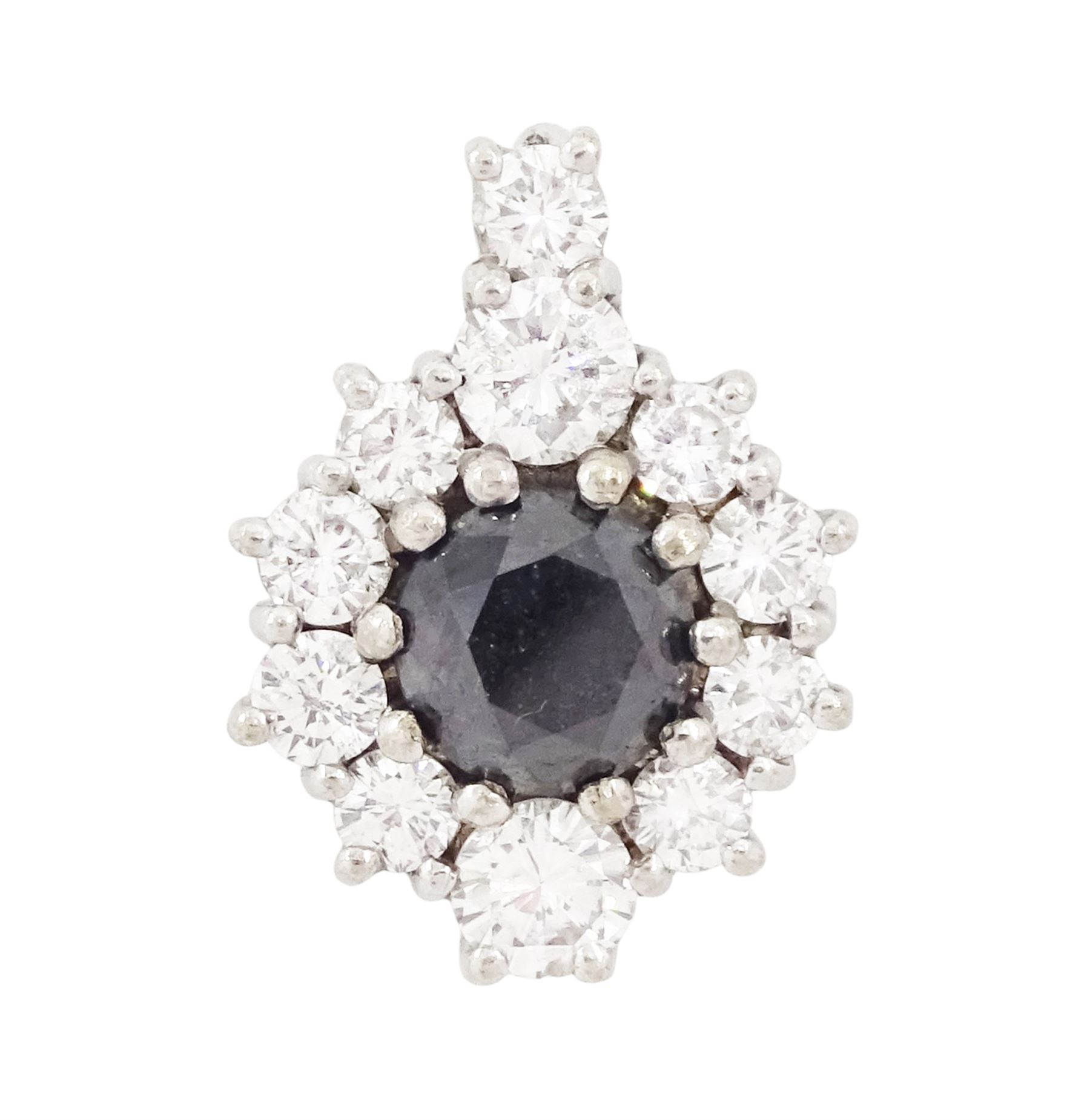 18ct white gold diamond pendant, single round brilliant cut black diamond of approx 0.90 carat, surrounded by ten round brilliant cut white diamonds, the bail set with a further diamond, total white diamond weight approx 0.80 carat