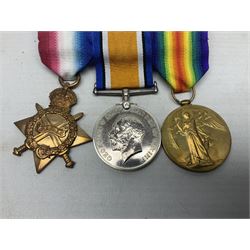 WW1 KIA group of three medals comprising British War Medal, 1914-15 Star and Victory Medal awarded to 9069 Cpl. J. Mayhew Glouc. R.; with ribbons; displayed on modern bar, and photograph of recipient in uniform; some biographical details