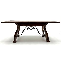 19th century rectangular European oak refectory style dining table, lyre shaped supports joined by scrolling metal work, single frieze cutlery drawer