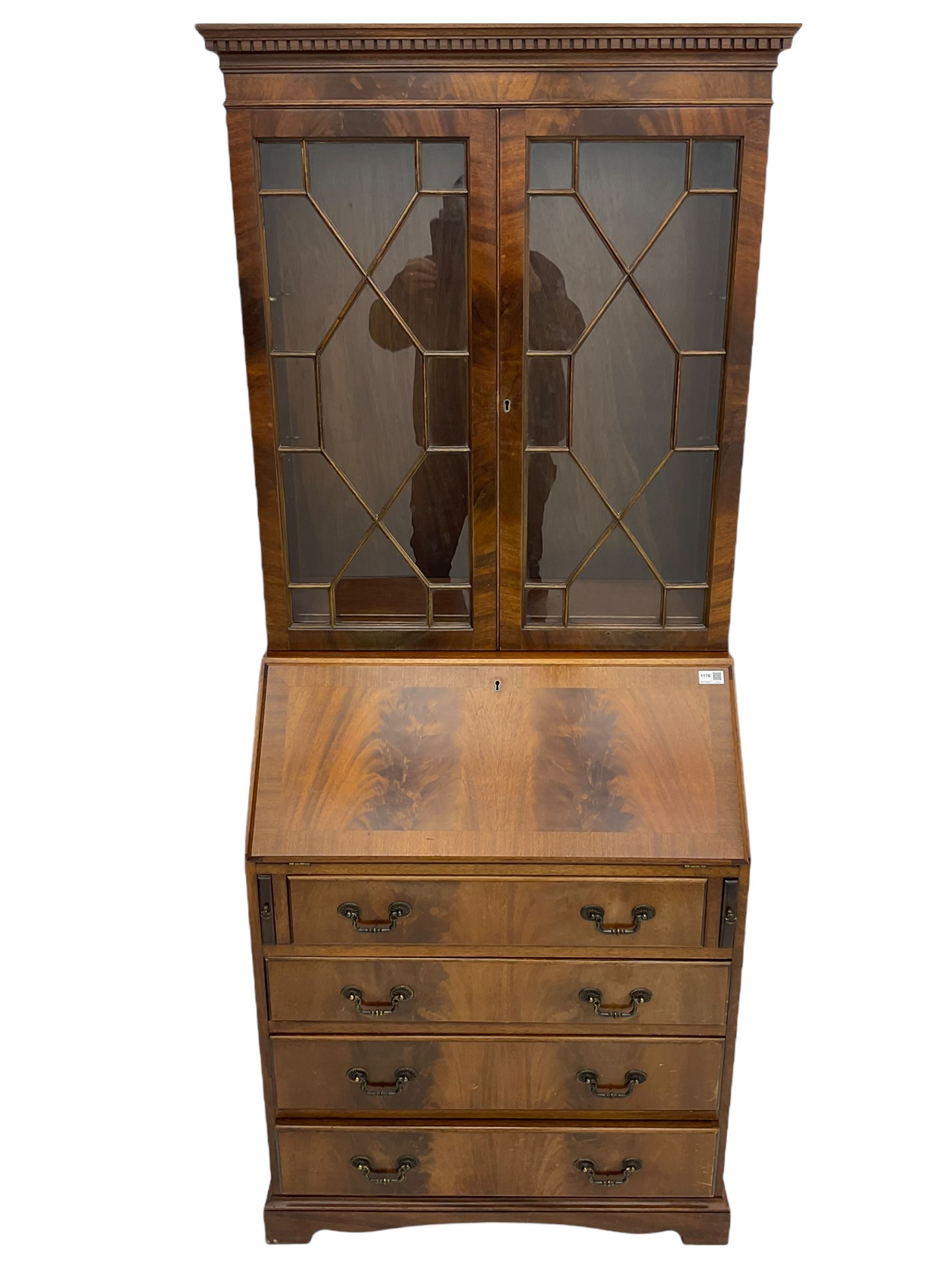 Reproduction mahogany bureau bookcase, the glazed bookcase over fall front bureau fitted with four drawers, on bracket feet