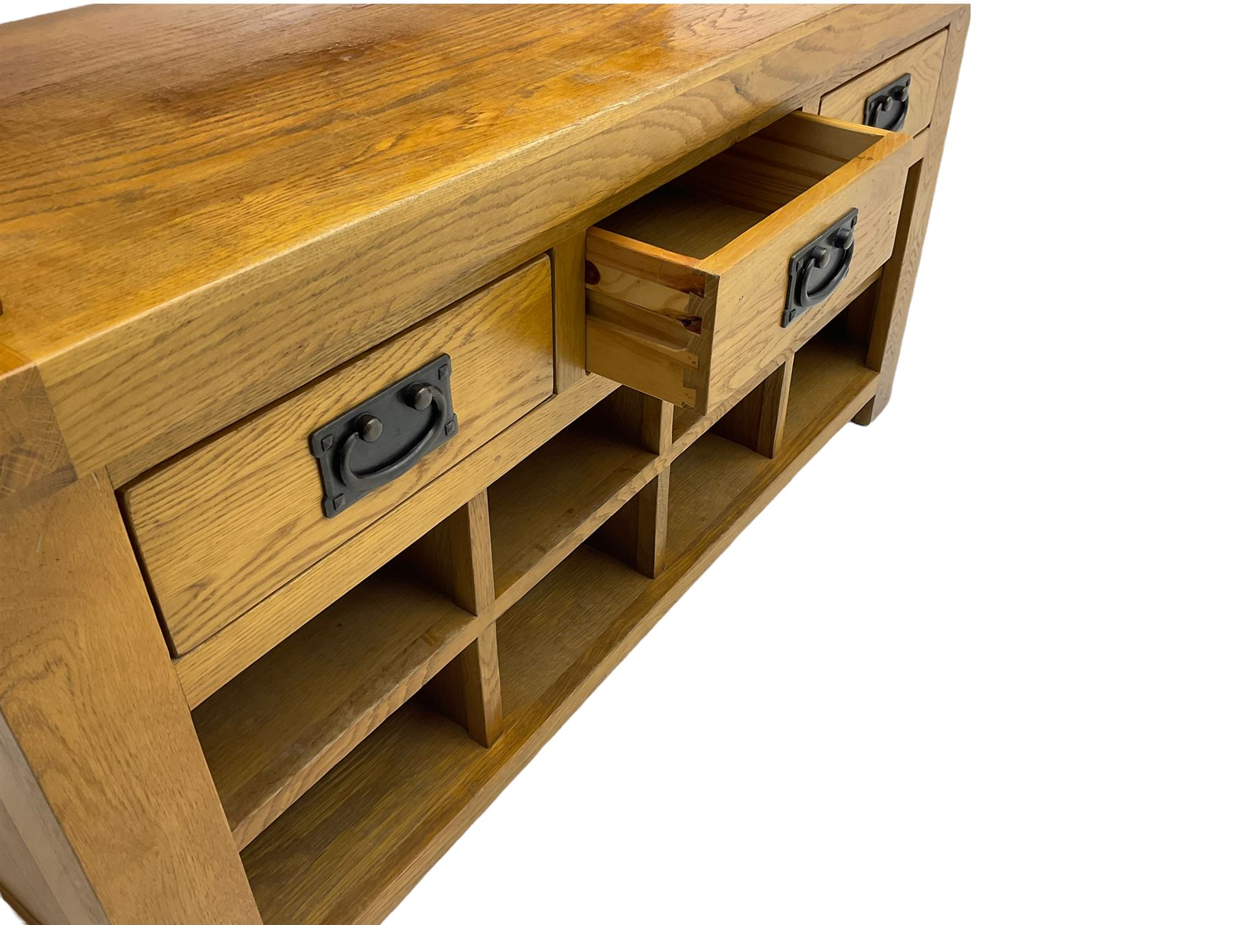 Light oak hall bench, tripled panelled back, fitted with drawers and shoe holes