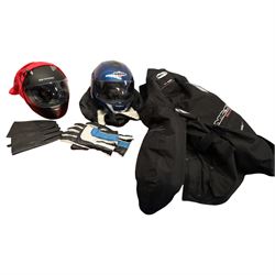 Collection of motorcycle clothing including MCS jacket, two pairs of gloves and two helmets 