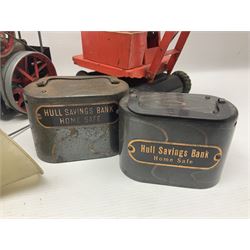 Mamod TE1a steam traction engine with burner, bunker, steering rod and funnel; red and black painted Tri-ang tin-plate Jones KL44 mobile crane; and two Hull Savings Bank Home Safe money boxes; all unboxed (4)