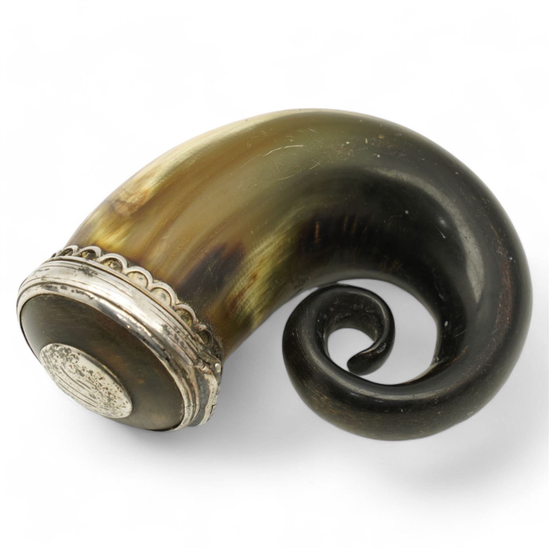 19th century Scottish rams horn snuff mill, the hinged cover with a silver plaque engraved with initials, below a silver scalloped mount, L10cm 
